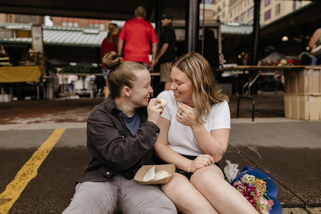 Savoring steamed buns together for their casual engagement photo session