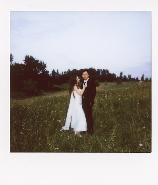 A couple celebrates the one year anniversary of their Minnesota elopement in this instant film photo