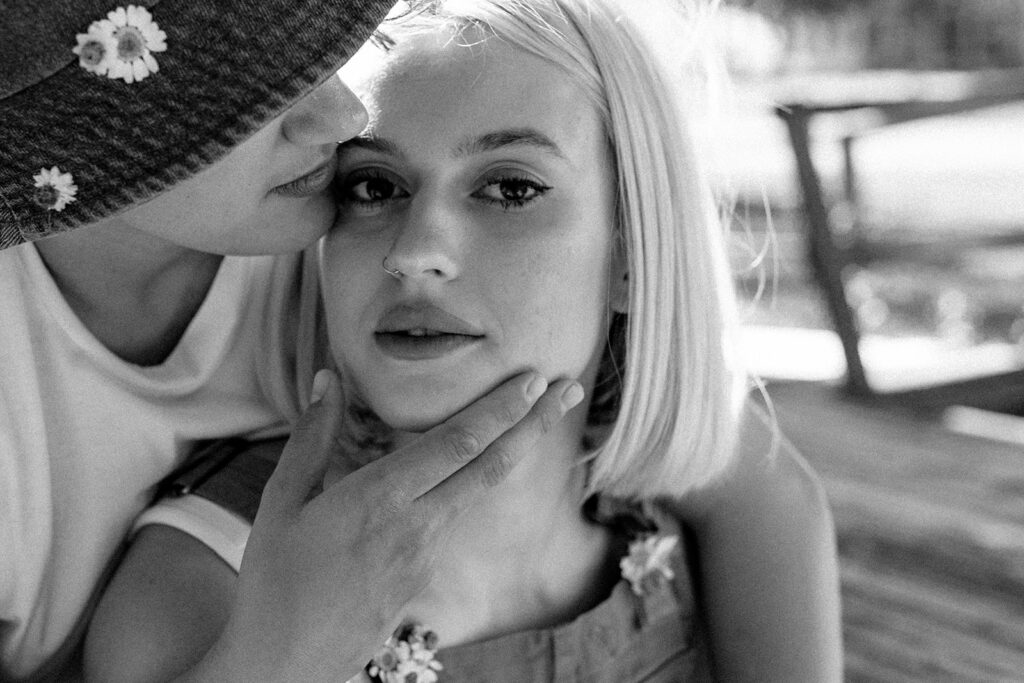 A black and white image of an LGBTQ couple taken by Twin Cities Couples Photographer, Gabby Bridge