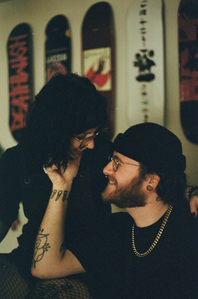 A film photo of a young engaged couple taken in their home by a Wisconsin photographer. 
