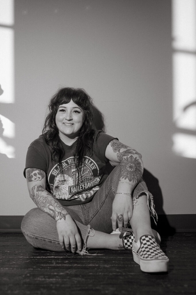 A b+w image Lady Luck Salon owner during a brand session with a Milwaukee headshot photographer. 