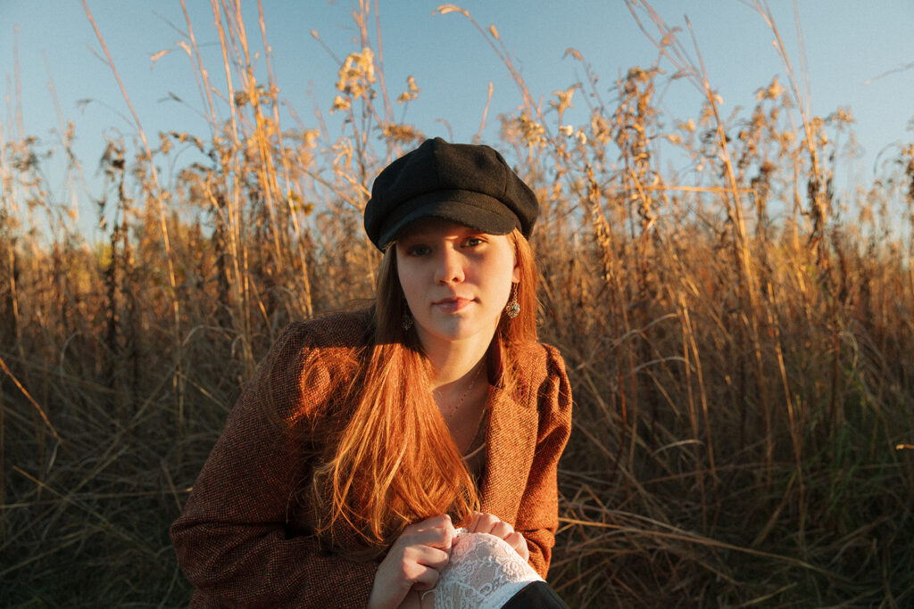A golden hour portrait of a young woman taken by a Minnesota senior photographer 