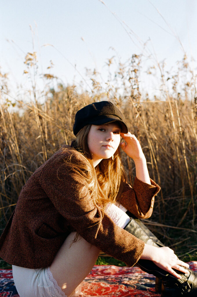 A film photo of a young woman taken at Afton State Park Minnesota for a senior photoshoot with a vintage feel 