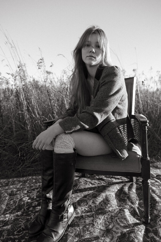 A black and white image of a young woman taken during a Minnesota senior photo session 